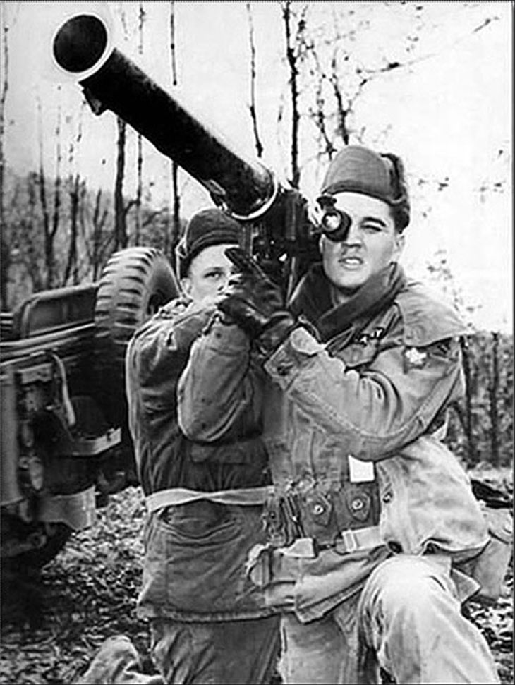 Elvis Presley with a bazooka in the U.S. Army, 1958